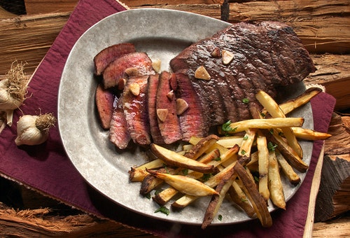 Steak and French Fries on Gray Plate