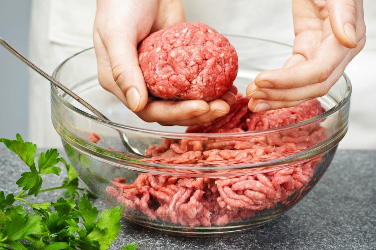 Person Cooking with Ground Beef
