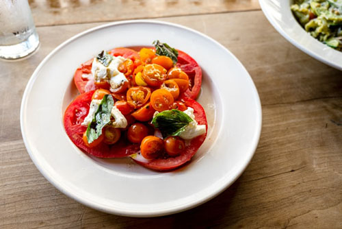Sliced Tomatoes and Green Leaf Salad