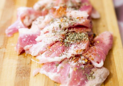 raw pork meat seasoned with seasonings