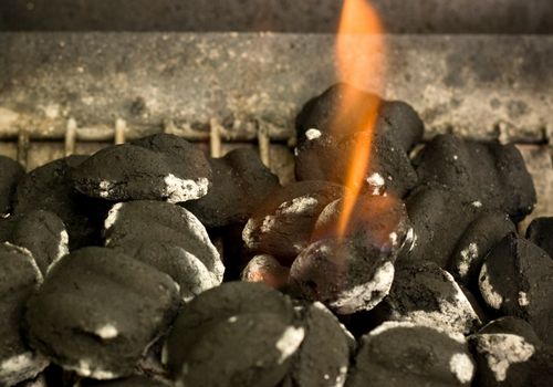 Flaming Charcoal Briquettes
