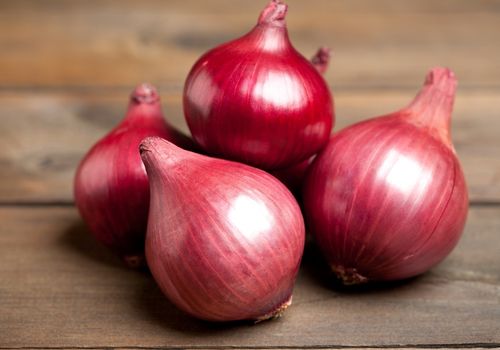 Red Onions on the Table