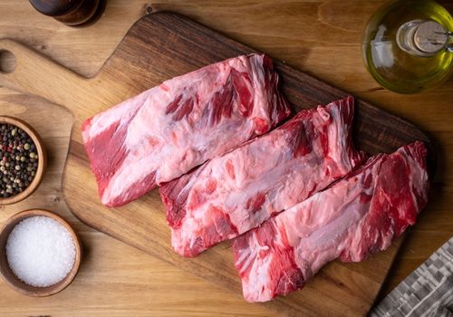 fresh beef back rib on wooden board