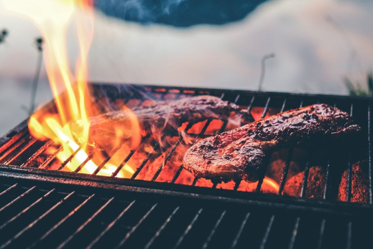 Steaks on the Flaming Hot Charcoal Grill