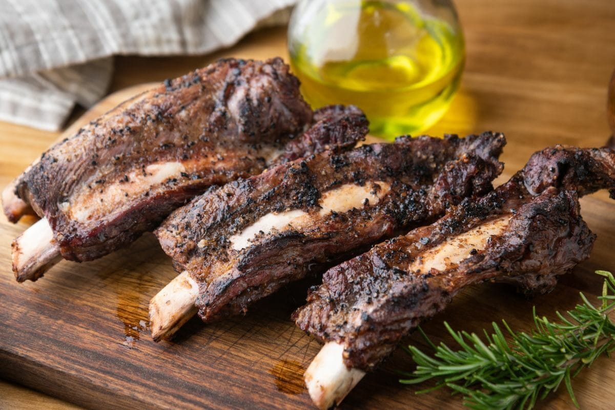 Grilled Beef Back Ribs on a Wooden Board