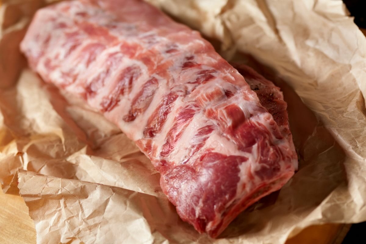 Raw Baby Back Pork Ribs in Butcher Paper