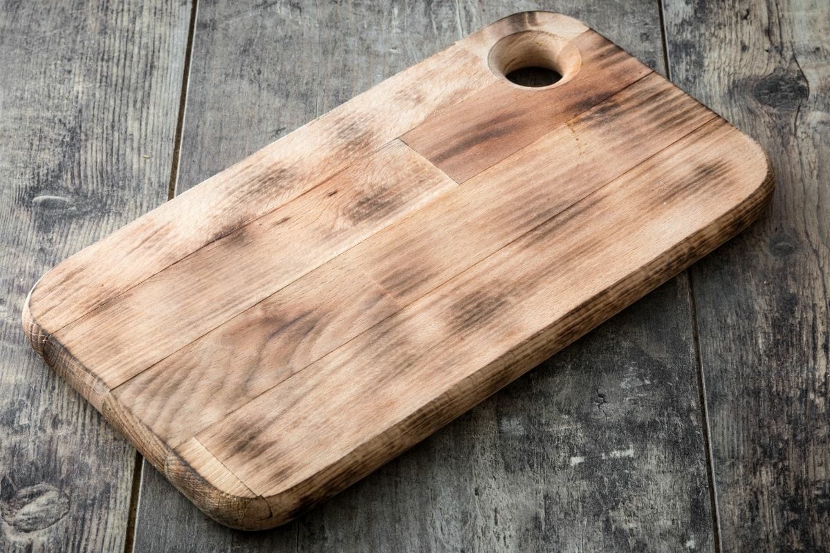 Cutting Board on a Wooden Background