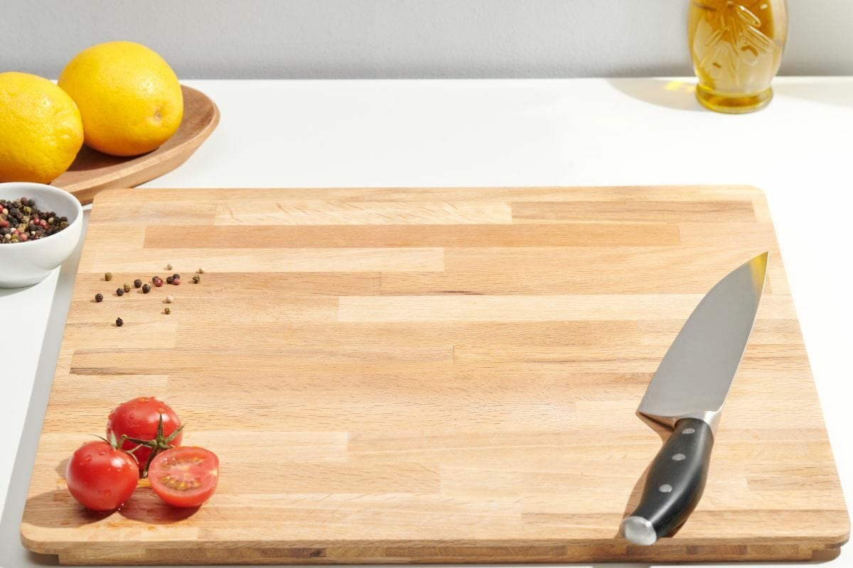 Cutting Board with Knife and Veggies