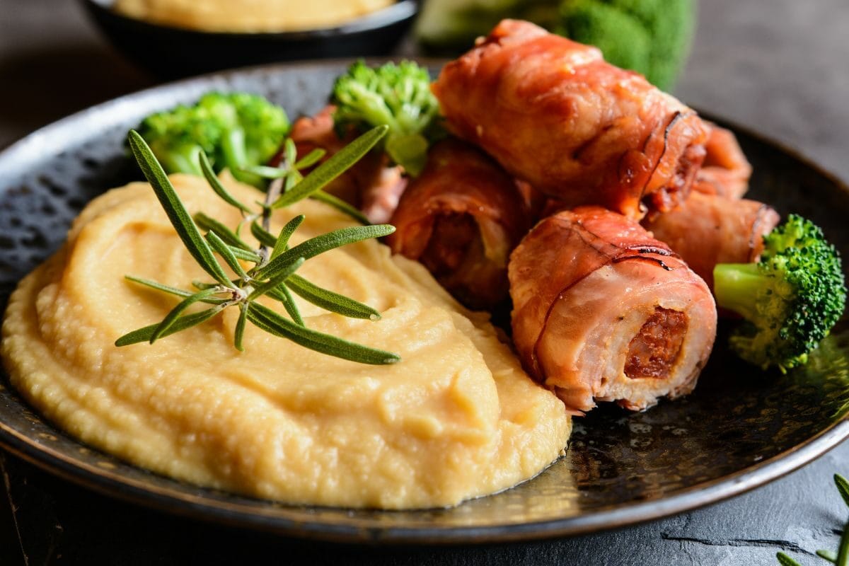 Roasted Sausages Wrapped in Bacon with Peas Puree and Broccoli
