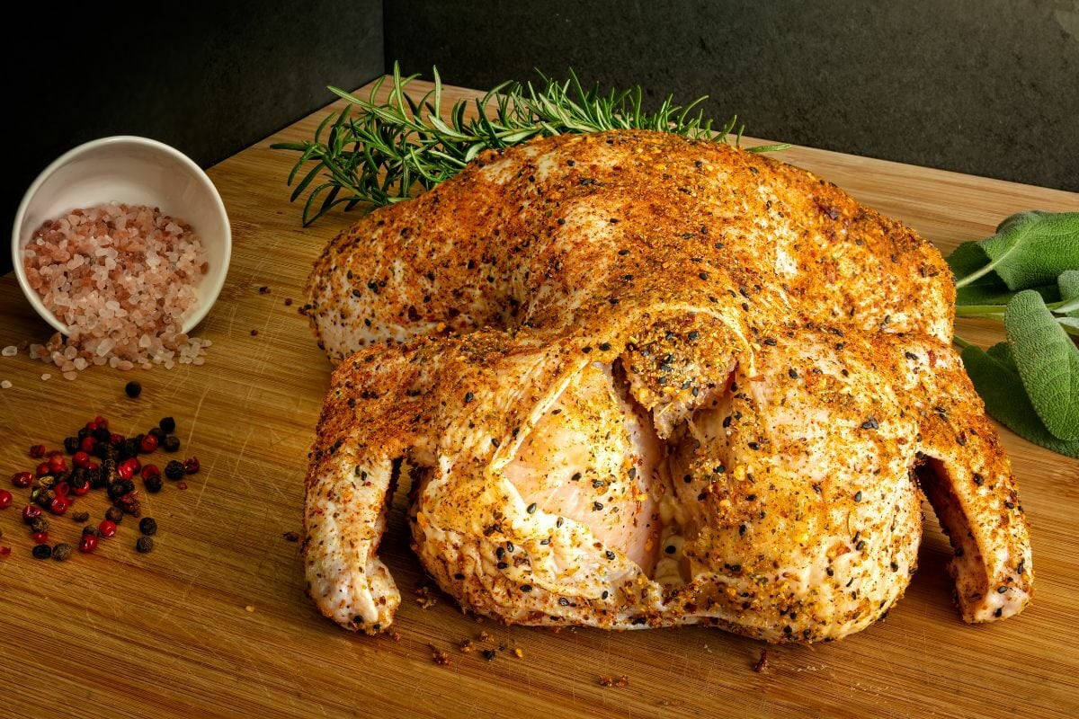 Whole Raw Chicken Rubbed with Spices