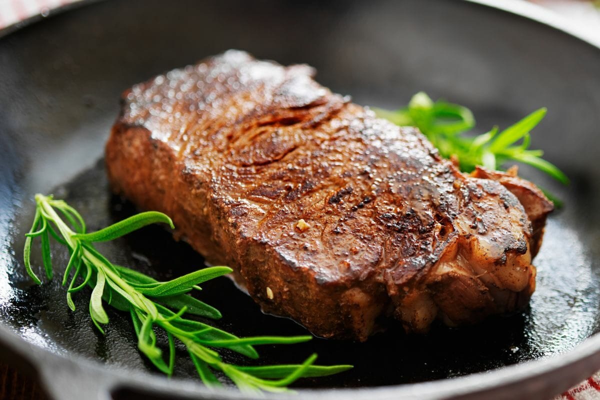 New York Strip Steak Cooked in Iron Skillet
